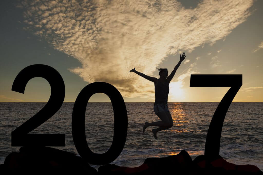 Person silhouette jumping in 2017